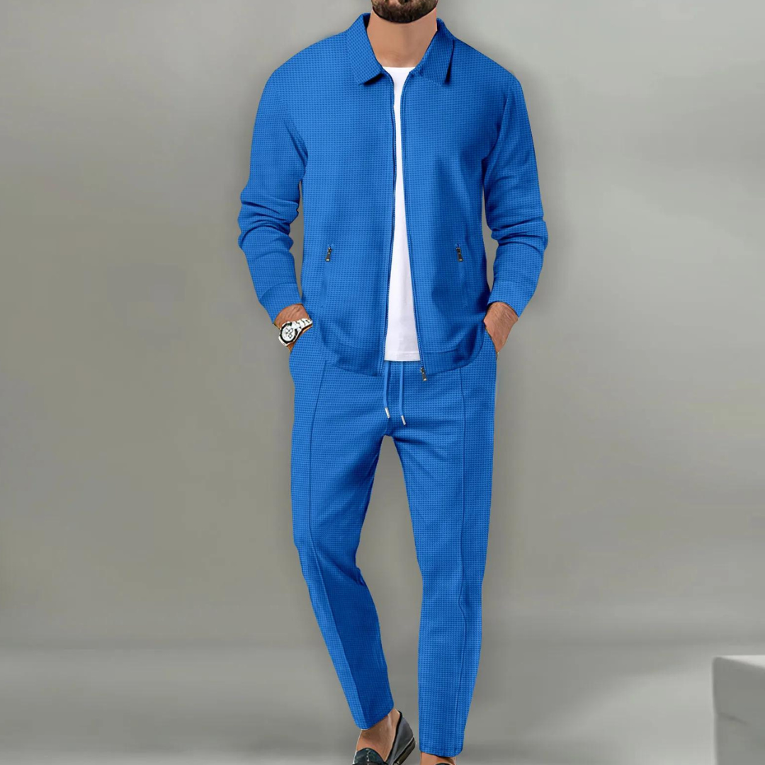 Blauw tweedelige set met ritssluiting en broek met elastische tailleband