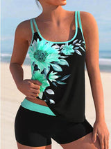 Zwart-groene tankini met bloemendessin en comfortabele short – stijlvol en actief