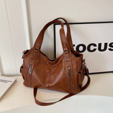 Close-up van Savannah Luxe Schoudertas met metalen accenten