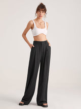 Zwarte high-waist wijde pantalon met crop top
