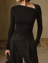 Zwarte asymmetrische knit top met lange mouwen
