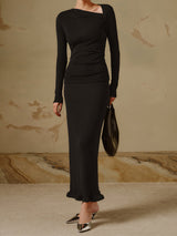 Zwarte asymmetrische knit top met lange mouwen
