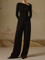 Zwarte asymmetrische knit top met lange mouwen
