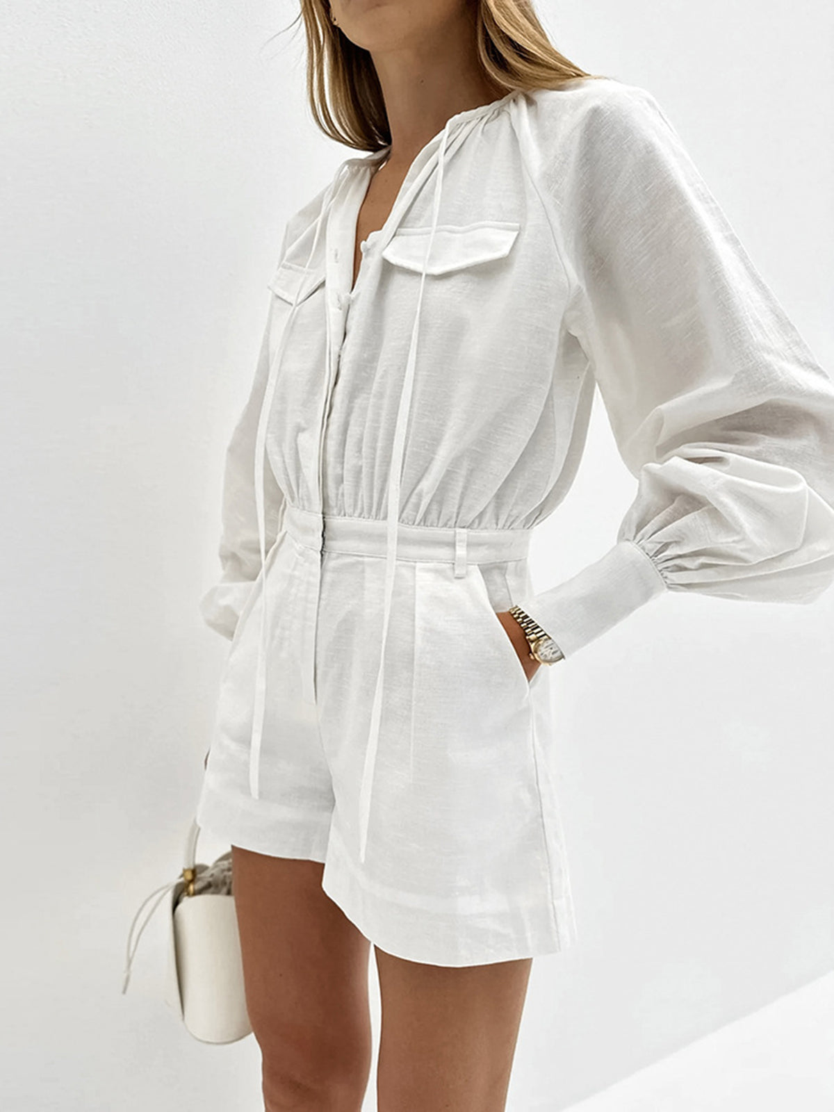 korte katoenen jumpsuit met lange mouwen
