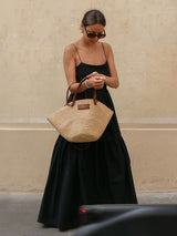 Zwarte maxi-jurk met open rug en bandjes
