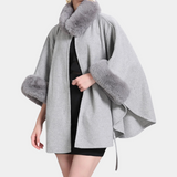 Modieus warm vest voor dames in acryl en wol







