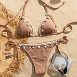 zandkleurige bikini met schelpen en zeesterren 