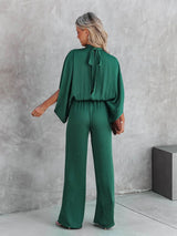 Formele jumpsuit dames groen hoge kraag

