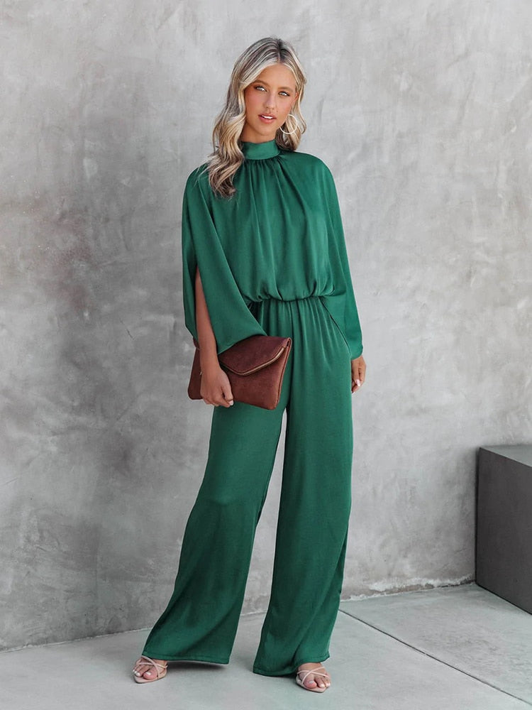 Elegante groene jumpsuit dames hoge kraag

