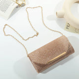 Aurora Charm Clutch in zwart – elegante clutch met glitterdetails.