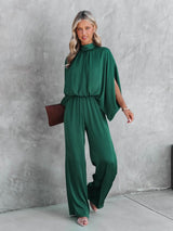 Elegante groene jumpsuit dames hoge kraag

