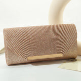 Aurora Charm Clutch in zwart – elegante clutch met glitterdetails.