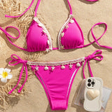 Roze bikini met schelpen en zeesterren 
