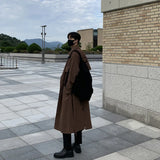 moderne trench met ceintuur
