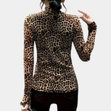 Flatlay van luipaard mesh top met lange mouwen
