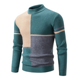 Turquoise trui met beige en grijze vlakken
